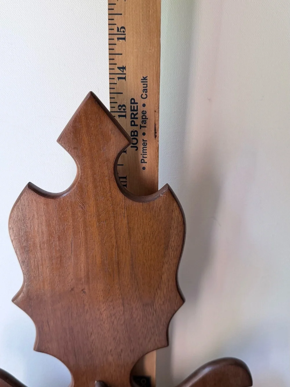 vintage wall sconce shelf made of carved wood with a dark finish